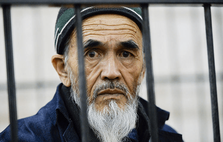 Journalist Azimjon Askarov is seen at a court in Bishkek, Kyrgyzstan, on October 11, 2016. On Tuesday, the country’s Supreme Court adjourned the hearing of Askarov’s final appeal until April 7. (AP/Vladimir Voronin)