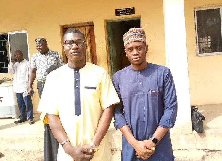 Alfred Olufemi (left) and Gidado Yushau (right) at court on January 13, 2020. (Photo: Adejumo Kabir/Premium Times)