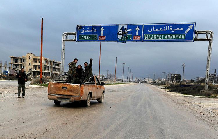 Syrian army soldiers are seen in Maarat al-Numan on January 30, 2020. At least five Syrian journalists were recently injured while embedded with Syrian government forces. (Reuters/Omar Sanadiki)