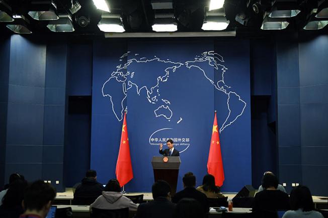 Chinese Foreign Ministry spokesperson Geng Shuang speaks during the daily press briefing in Beijing on March 18, 2020. China's Foreign Ministry recently announced it would take action to expel more than a dozen U.S. journalists. (AFP/Greg Baker)