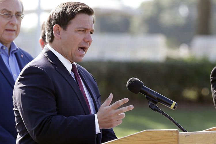 Florida Governor Ron DeSantis is seen in The Villages, Florida, on March 23, 2020. Authorities at the Florida State Capitol recently barred journalist Mary Ellen Klas from attending a news briefing by DeSantis. (AP/John Raoux)