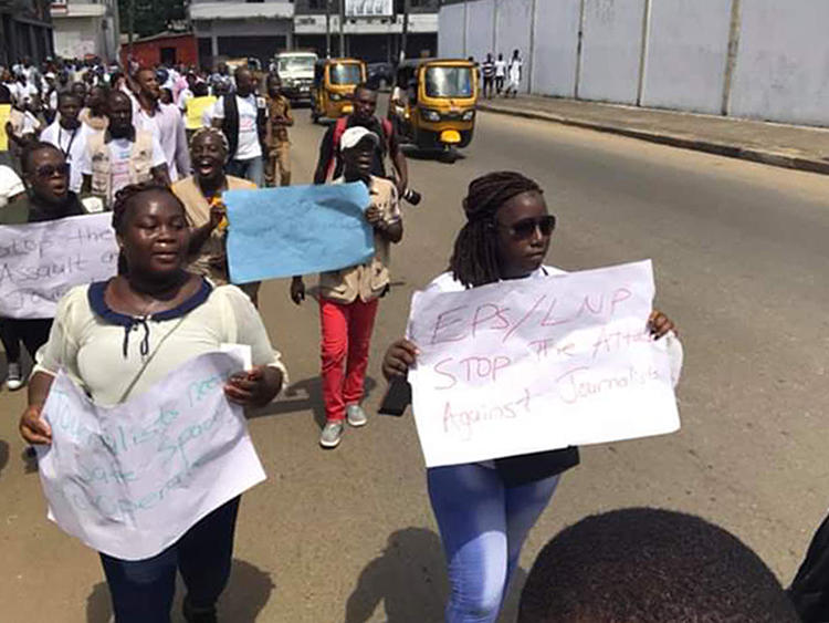 Liberian journalists protest against authorities' alleged brutality against their colleagues in Monrovia, Liberia, on March 12, 2020. (FrontPage Africa/Alline Dunbar)