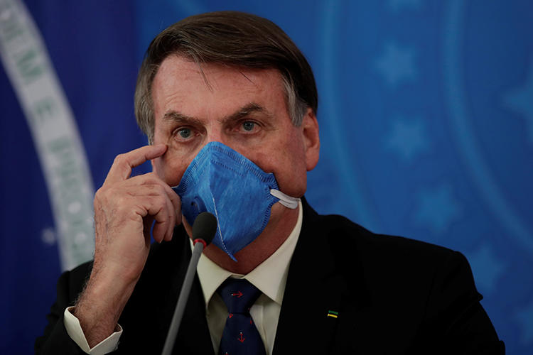 Brazilian President Jair Bolsonaro is seen in Brasilia on March 20, 2020. Bolsonaro recently passed a provisional regulation restricting access to public records. (Reuters/Ueslei Marcelino)