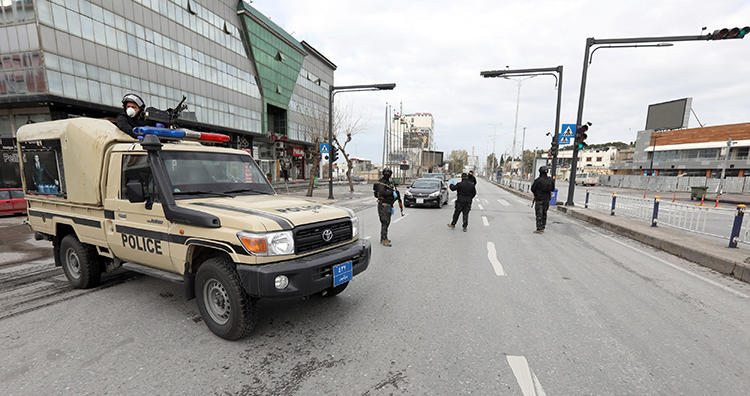 Security forces are seen in Sulaimaniya, Iraqi Kurdistan, on March 14. 2020. Unidentified individuals recently tortured and robbed journalist Adnan Rashidi in Iraqi Kurdistan. (Reuters/Ako Rasheed)