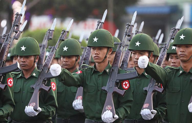 Soldiers are seen in Yangon, Myanmar, on February 12, 2020. The country's army recently filed a criminal defamation complaint against the Reuters news agency and a local lawmaker. (Reuters/Ann Wang)