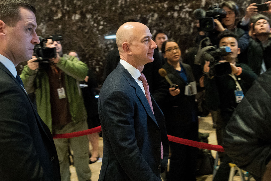Jeff Bezos, chief executive of Amazon and owner of The Washington Post, arrives for a meeting with then-President-elect Trump at Trump Tower in New York on December 14, 2016. The president has frequently referred derisively to “the Amazon Washington Post.”  (Drew Angerer/Getty Images/AFP)