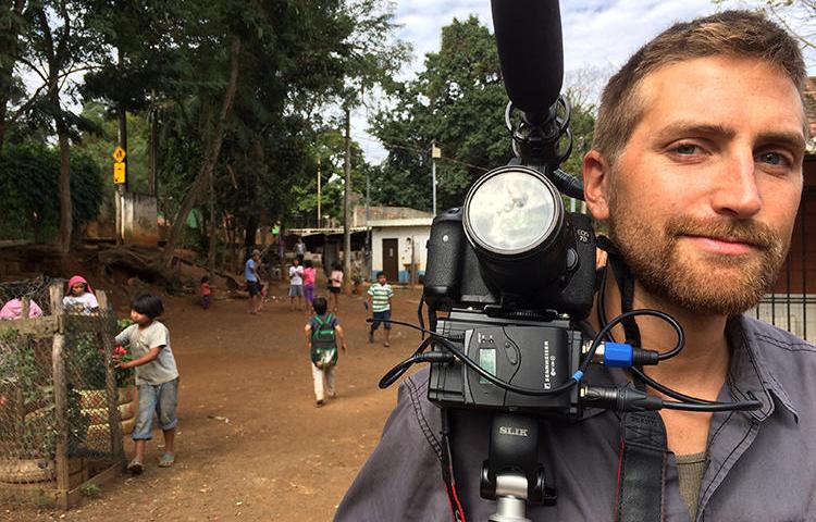 Video journalist Jon Gerberg is seen on assignment in Brazil. Gerberg told CPJ about the challenges of reporting on the COVID-19 pandemic. (Gustavo Canzian)