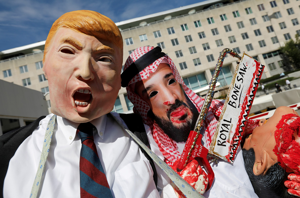 Activists dressed as Trump and Saudi Crown Prince Mohammad bin Salman demonstrate in front of the U.S. State Department in Washington on October 19, 2018, calling for sanctions against Saudi Arabia. The CIA determined that the crown prince directed the murder of Washington Post columnist Jamal Khashoggi. (Reuters/Kevin Lamarque)