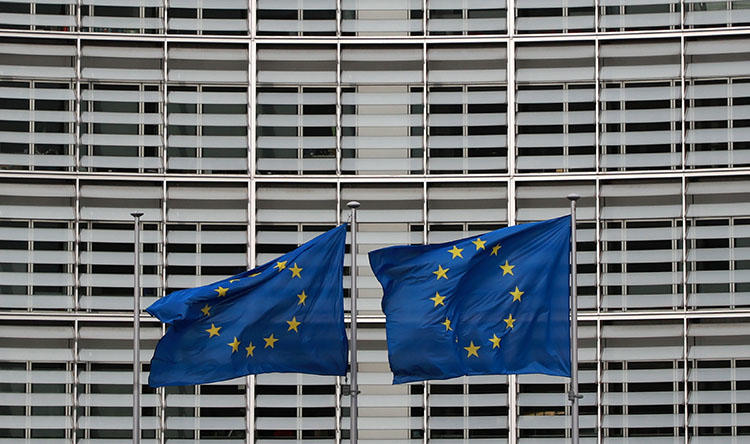 European Union flags fly during a special European Council summit in Brussels on February 21, 2020. (AFP/ Ludovic Marin)