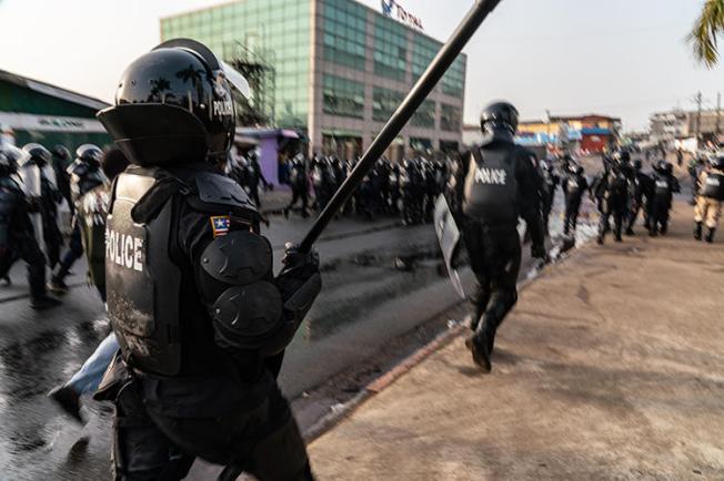 Police are seen in Monrovia, Liberia, on January 6, 2020. Security forces recently harassed and attacked at least four journalists in Liberia. (AFP/Carielle Doe)