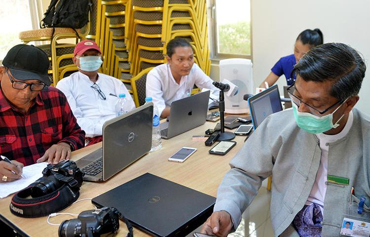 Journalists are seen in Naypyidaw, Myanmar, on March 13, 2020. The Myanmar government recently ordered dozens of news websites to be blocked. (AFP/Thet Aung)