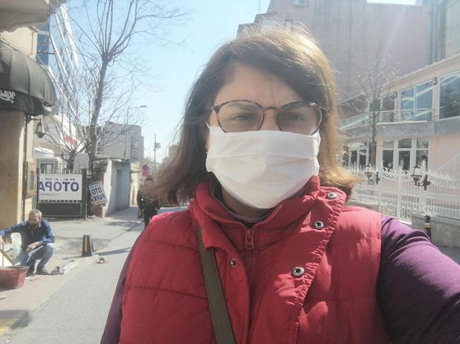 Journalist Evrim Kepenek is seen while covering COVID-19 in Istanbul, Turkey. (Evrim Kepenek)