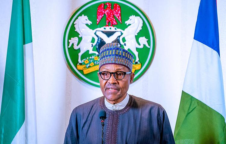 Nigerian President Muhammadu Buhari addresses the nation from Abuja on March 29, 2020. A team of journalists from Africa Independent Television were recently expelled from an event Buhari attended. (Nigeria Presidency/Handout via Reuters)