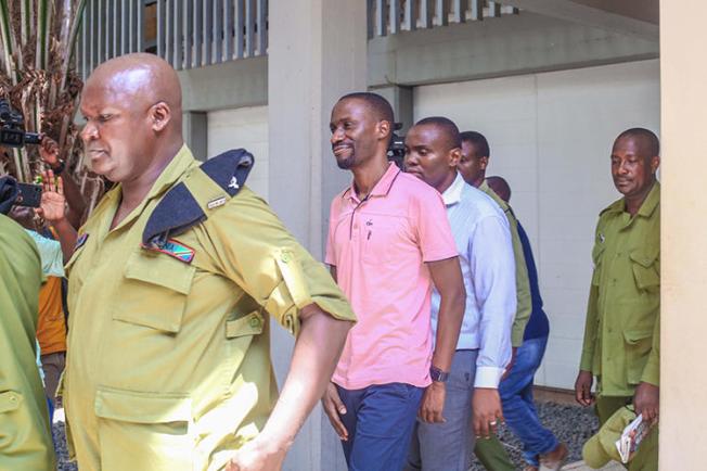 Maxence Melo leaves court in Dar es Salaam yesterday after being convicted of obstructing police investgiations. (Jamii Forums)