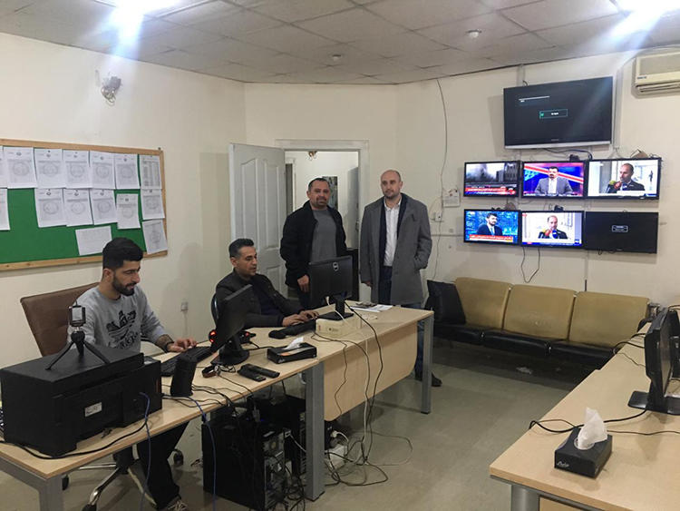 Sirwan Gharib (second from right) is seen in the Westga News office, in Sulaymaniyah, in February 2019. (Photo: Muhammad Tayib)