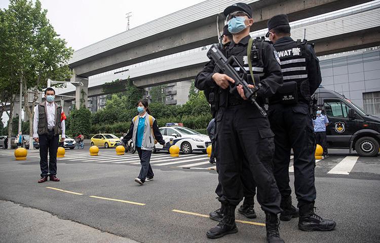 Police officers are seen in Wuhan, China, on May 6, 2020. Journalist Zhang Zhan recently went missing in Wuhan, and is now detained in Shanghai. (AFP)