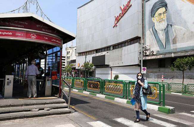 A street in Tehran is seen on April 21, 2020. Iranian journalist Hassan Fathi recently began a jail term for speaking with the BBC. (AFP/Atta Kenare)