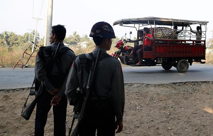 Police officers are seen in Sittwe, Myanmar, on March 3, 2017. Journalist Kyaw Linn was recently attacked and threatened in Sittwe. (Reuters/Soe Zeya Tun)