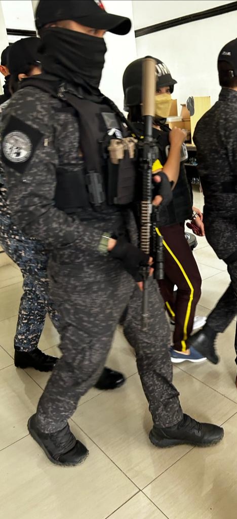 Jailed Philippine journalist Frenchie Mae Cumpio (center, in helmet) leaves the courthouse after a hearing in Tacloban City, Philippines. April 17, 2023.