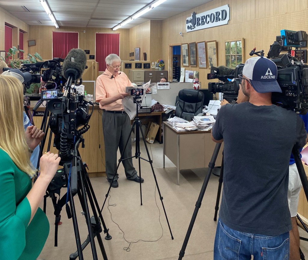 Marion County Record owner and editor Eric Meyer holds a freshly printed edition of the newspaper on August 16, 2023, as he addresses an impromptu press conference for reporters in Marion to cover the aftermath of a police raid on the publication five days earlier. (Photo: Katherine Jacobsen)