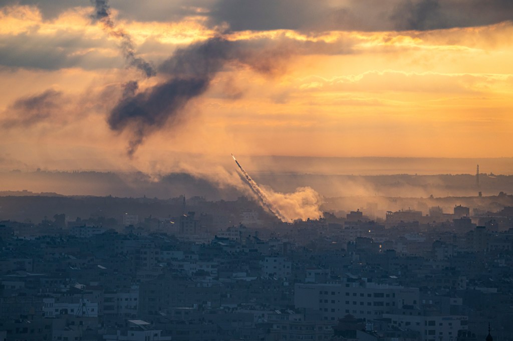 Rockets are fired toward Israel from the Gaza Strip, Saturday, Oct. 7, 2023.