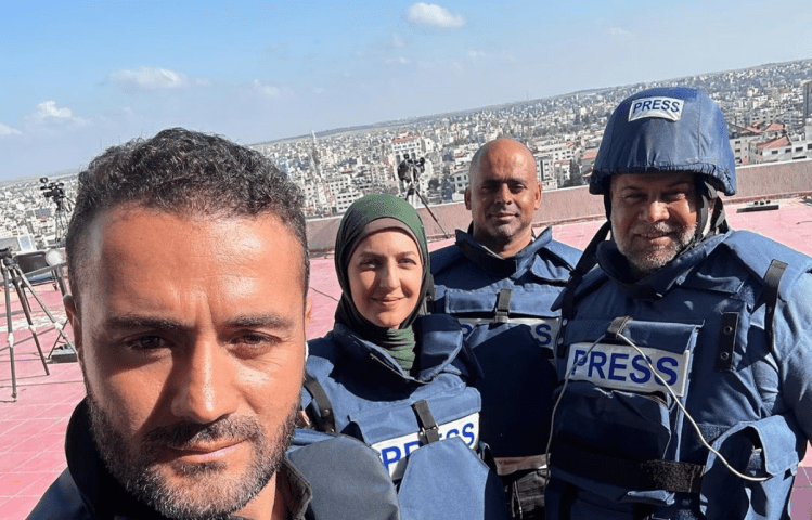 Journalists Hamdan Dahdouh, Youmna Al-Sayed, and Wael Al Dahdouh in Gaza, on October 31, 2023.