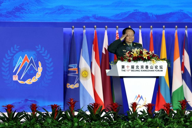 China's Central Military Commission Vice Chairman Zhang Youxia salutes at the Beijing Xiangshan Forum in Beijing, China, on October 30, 2023.