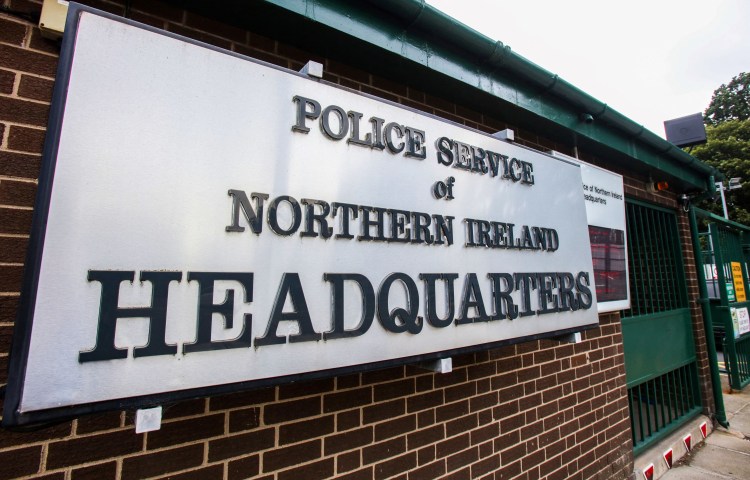 A photograph taken on August 10, 2023 shows the logo of the Police Service of Northern Ireland at the entrance of the headquarters in Belfast.