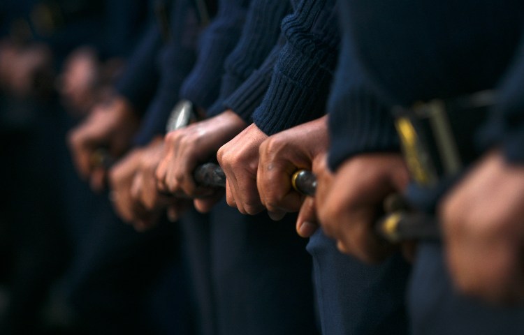 Police stand guard in Kathmandu, Nepal, on November 25, 2021. (Photo: AFP/Prakash Mathema)