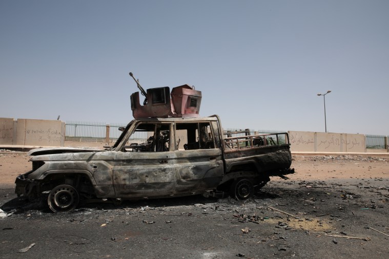 A destroyed military vehicle in Khartoum, Sudan, on April 20, 2023.