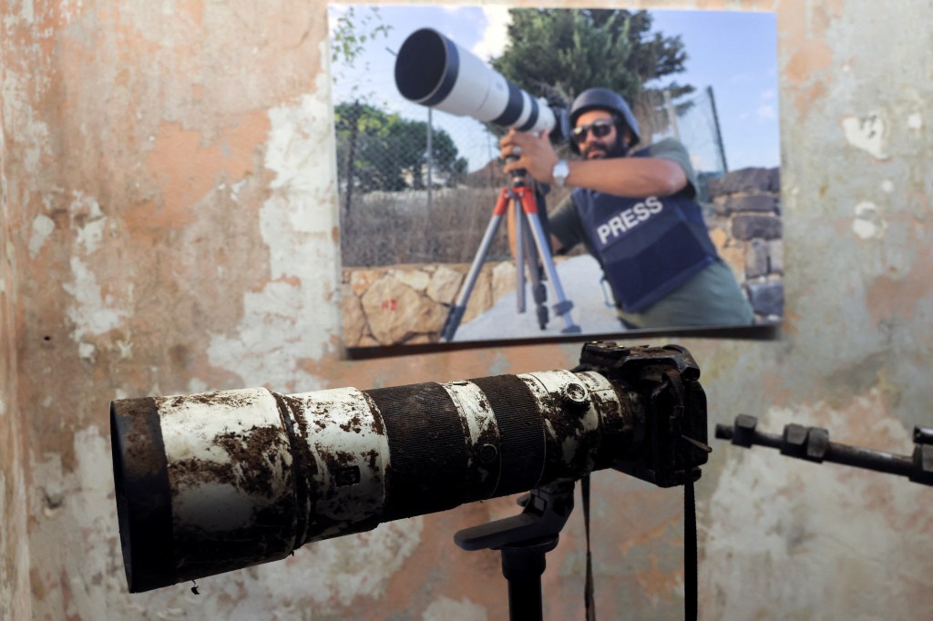 The camera that belonged to Reuters journalist Issam Abdallah, who was killed by Israeli strikes in southern Lebanon on October 13, is displayed at a press conference by Amnesty International and Human Rights Watch as they released findings from their investigations into his death in Beirut, Lebanon, on December 7, 2023.