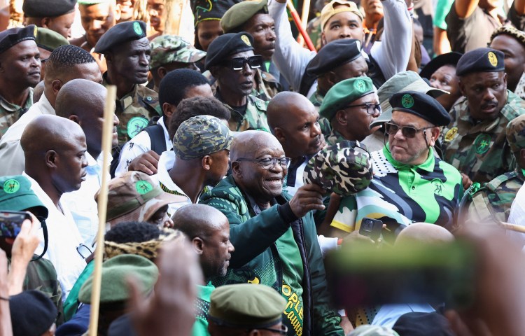 Former South African president Jacob Zuma arrives at a rally in Soweto on May 18, 2024, to launch the manifesto of his new political party, uMkhonto we Sizwe, ahead of South Africa’s May 29 general election. Men wearing military fatigues assaulted a number of of journalists at the rally. (Reuters/Siphiwe Sibeko)