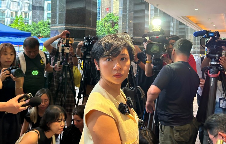 Selina Cheng, a former reporter at the Wall Street Journal speaks to media in Hong Kong on Wednesday, July 17, 2024.