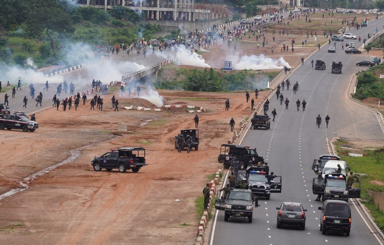 Nigerian security forces lob teargas canisters to disperse an anti-government demonstration to protest against bad governance and economic hardship in Abuja, Nigeria, on August 2, 2024.