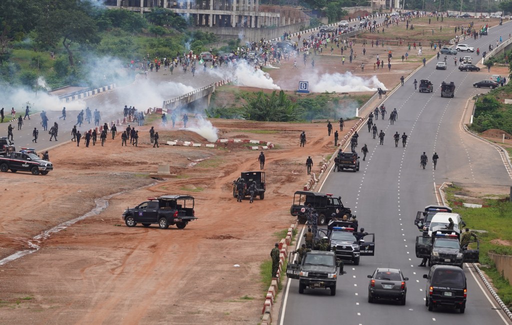 Nigerian security forces lob teargas canisters to disperse an anti-government demonstration to protest against bad governance and economic hardship in Abuja, Nigeria, on August 2, 2024.