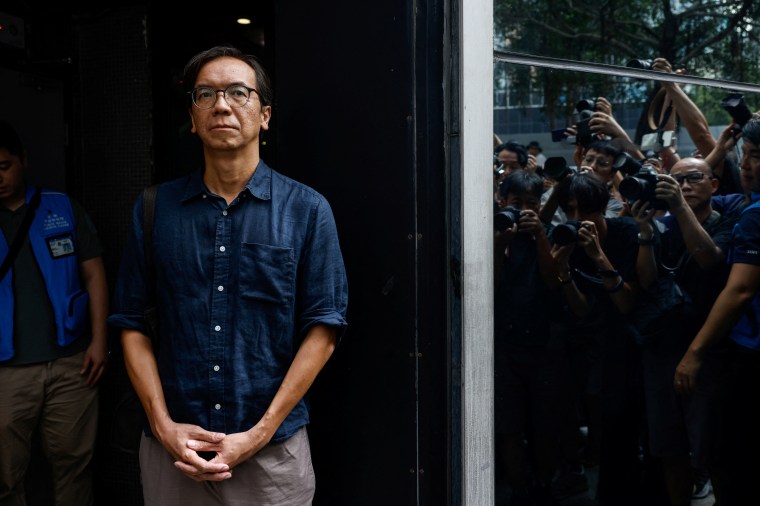 Chung Pui-kuen, former chief editor of Stand News, leaves the district court on bail after the verdict in a landmark sedition trial against two former editors of the now-defunct media outlet, in Hong Kong, China, on August 29.