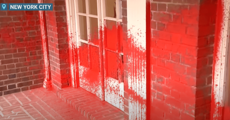 Red paint sprayed on the apartment building of Brooklyn Museum's Jewish director.