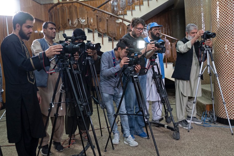 Afghan journalists attend a press conference in Kabul on September 19.