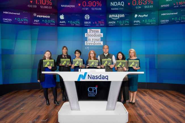 Sebastien Lai (third from right) campaigns for his father Jimmy Lai's release with his international legal team and the Committee to Protect Journalists staff during World Press Freedom Day at the Nasdaq MarketSite in New York City in May 2023.