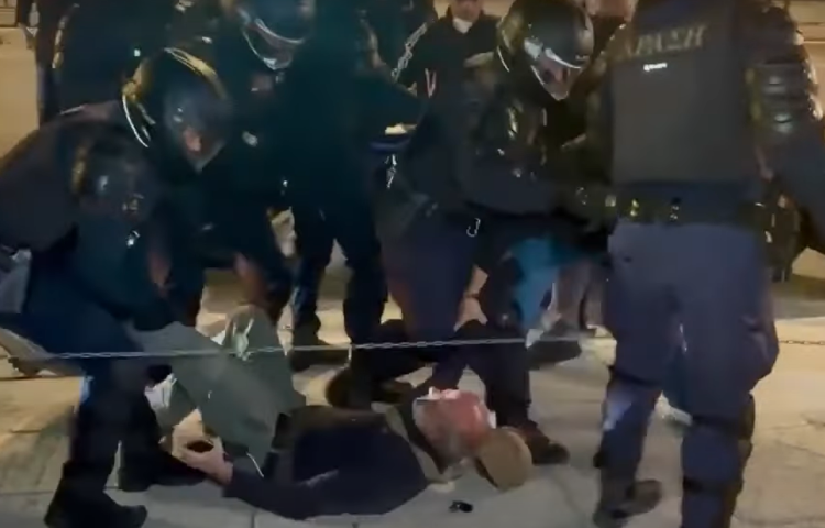 Riot police dragg Giorgos Androutsou along the ground during a protest by firefighters in the capital Athens on October 31, 2024.