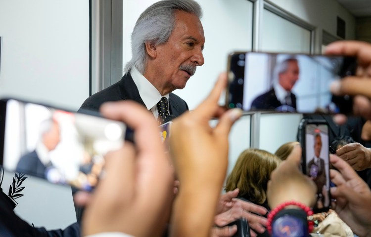 Guatemalan journalist José Rubén Zamora, founder of elPeriódico newspaper, was freed, talks with reporters on October 18, 2024, in Guatemala City before leaving jail for house arrest. A court later ruled that he return to prison. (Photo: AP/Moises Castillo)