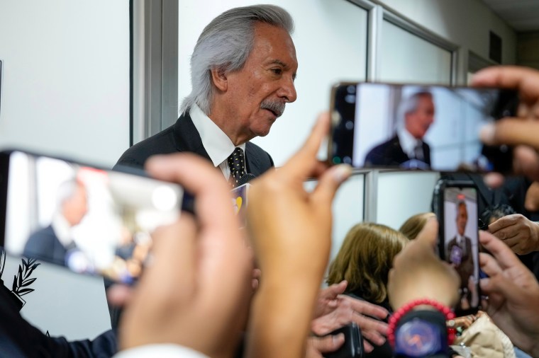 Guatemalan journalist José Rubén Zamora, founder of elPeriódico newspaper, was freed, talks with reporters on October 18, 2024, in Guatemala City before leaving jail for house arrest. A court later ruled that he return to prison. (Photo: AP/Moises Castillo)