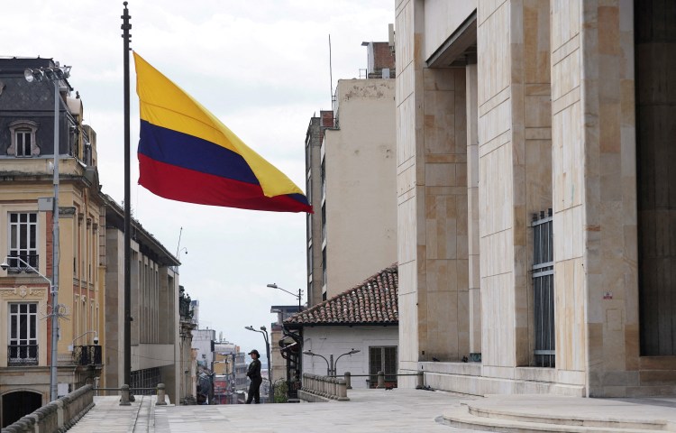 Colombian police stand guard outside the Palace of Justice following suspicions of a plan to attack the headquarters of the Supreme Court of Justice, according to authorities, in Bogota, Colombia August 16, 2024. (Reuters/Nathalia Angarita)