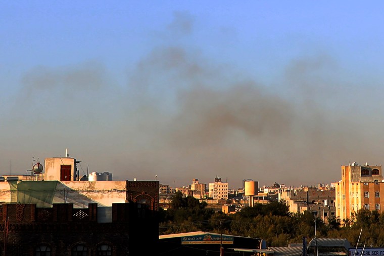 Smoke rises from the area around the International Airport following an Israeli airstrike, as seen from Sanaa, Yemen, on December 26, 2024. Separately, the Yemeni branch of Al-Qaeda announced on December 28 the execution of 11 individuals, including Yemeni journalist Mohamed Al-Maqri. (Photo: AP/Osamah Abdulrahman)