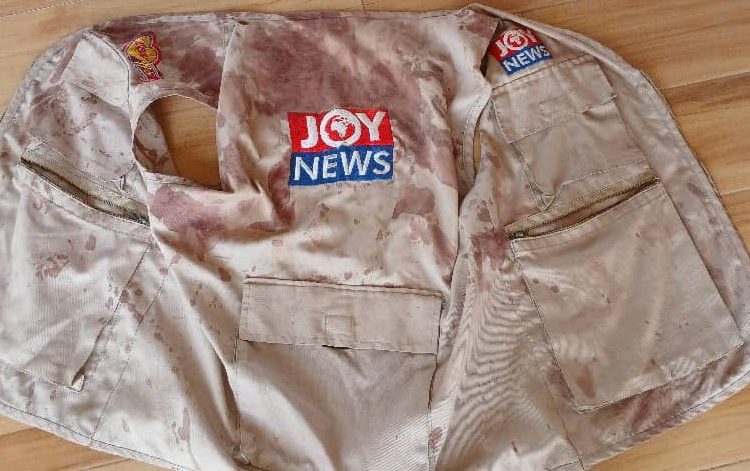 The bloodstained jacket of journalist Ohemeng Tawiah is shown. Armed men attacked Tawiah with stones and machetes after he and his camera operator joined a police team investigating allegations of illegal mining at a site in Ghana’s northern Ashanti region on December 20, 2024. (Photo: Courtesy of Tawiah)