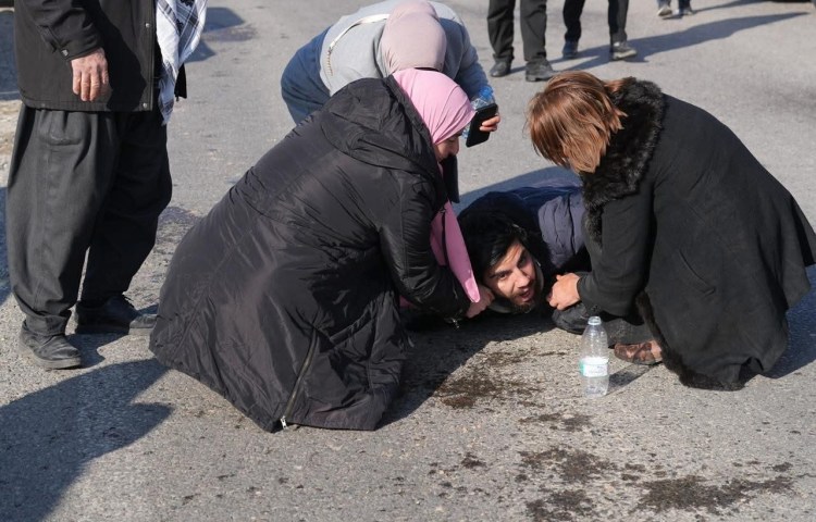 Slemani News Network camera operator Sivar Baban struggles to breathe after being teargassed during a Kurdistan teachers’ protest on February 9.