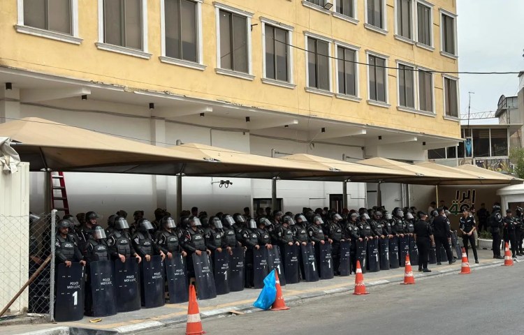 Security forces stationed outside Al Rabiaa TV in the Iraqi capital Baghdad on April 25 after it was threatened with arson in a Telegram post.