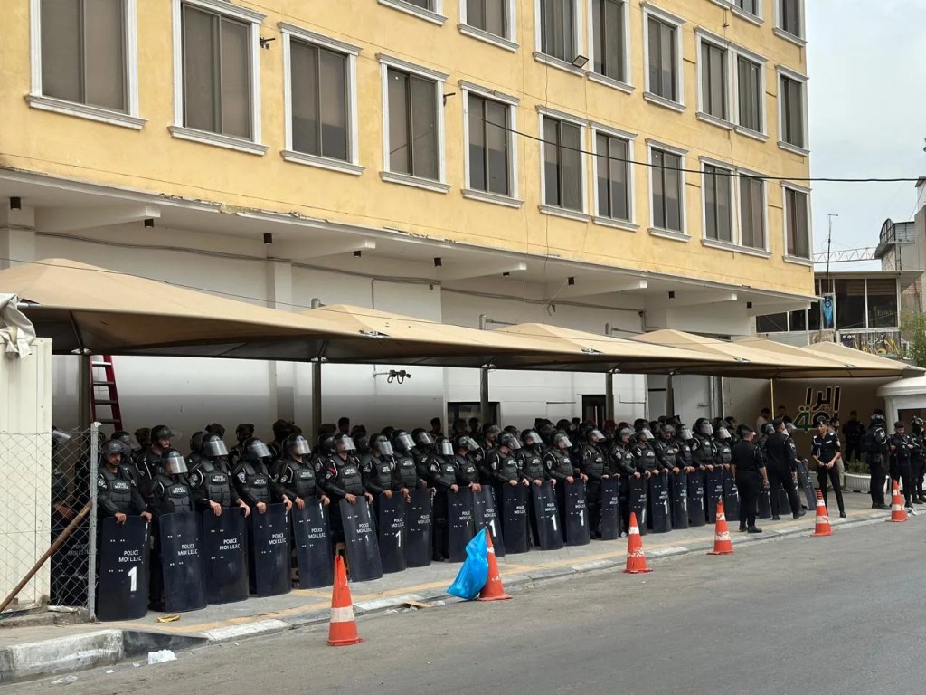 Security forces stationed outside Al Rabiaa TV in the Iraqi capital Baghdad on April 25 after it was threatened with arson in a Telegram post.