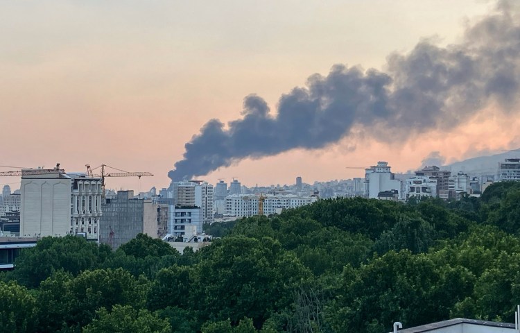 Smoke rises from the building of Iran's state-run television after an Israeli strike in Tehran on June 16, 2025. (Photo: AP)