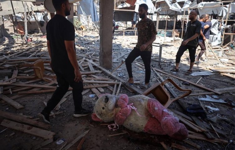 A man walks through the wreckage inside Al-Baqa Café after it was targeted by an Israeli airstrike in western Gaza City on June 30, 2025. (Photo: Courtesy of Majdi Fathi)